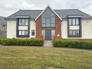 House Exterior With New Door
