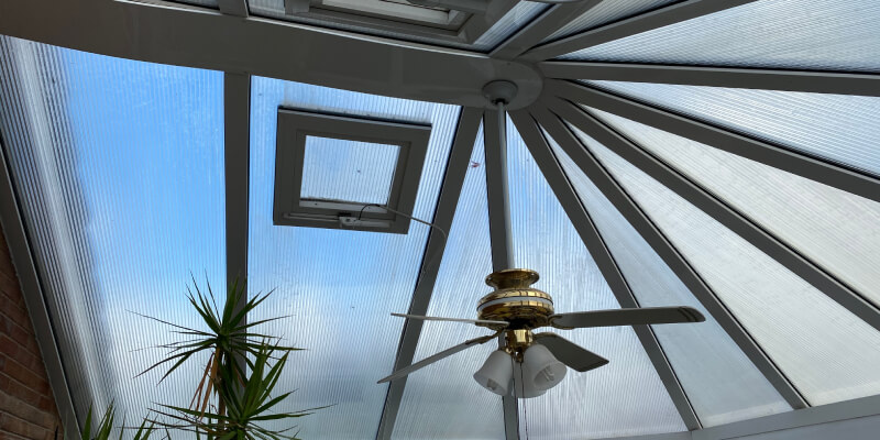 Conservatory roof with fan